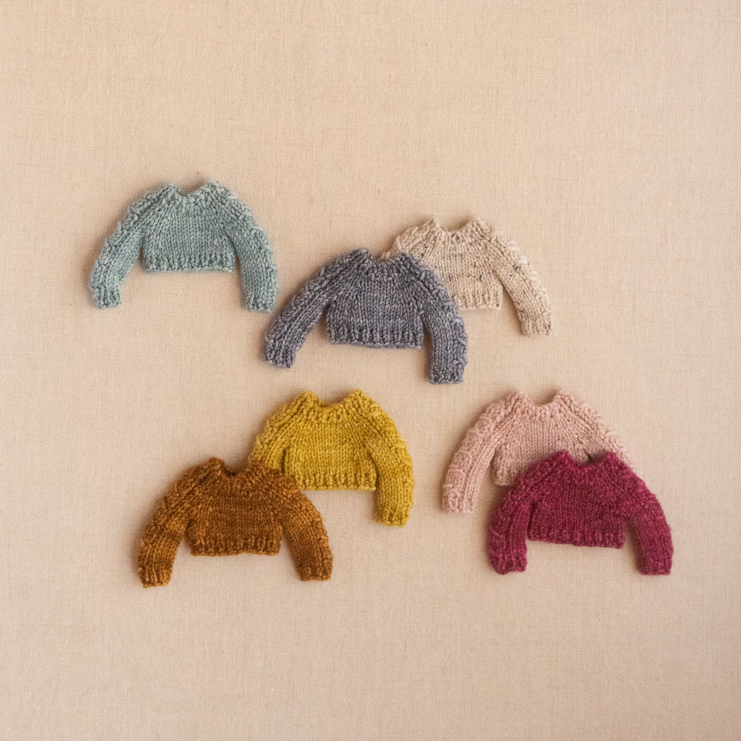 hand-knit cable sleeve sweater